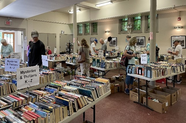 People shopping at the library book sale